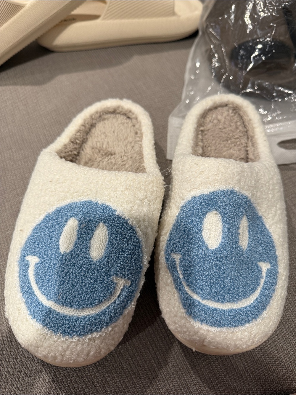 Cozy White Sherpa Slippers with Blue Smiley Face